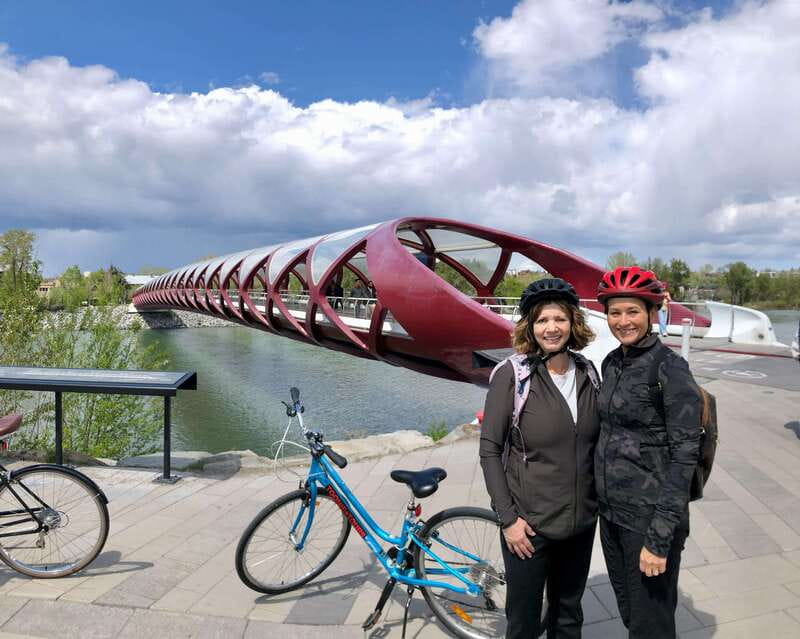 Calgary: City Bike Tour, Highlights and Bow River - Starting at Toonie Tours and Setting Off Through Downtown Calgary