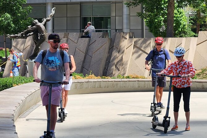Calgary City Highlights 2 Hour E-Scooter Tour - Bow River pathways, The Bow, and Central Memorial Park: classic views without the full-day grind