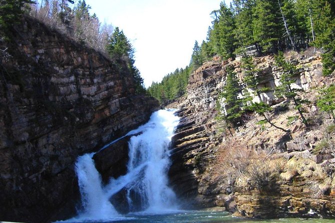 Waterton Lakes National Park Scenic Day Tour from Calgary - Red Rock Canyon: color layers and a photo-friendly stop